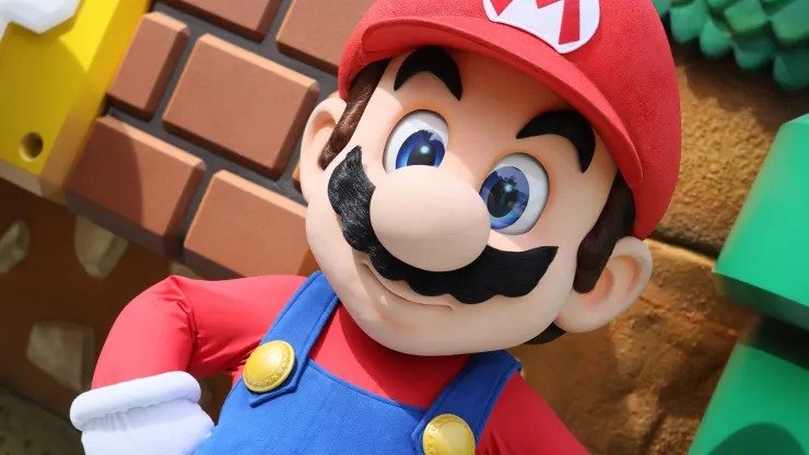 Super Mario interagindo com crianças em uma churrascaria